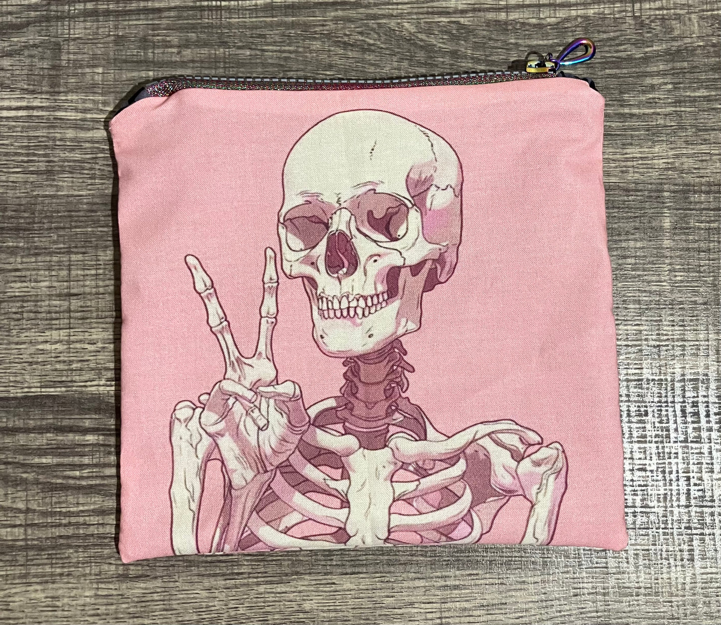 Skull zipper clutch